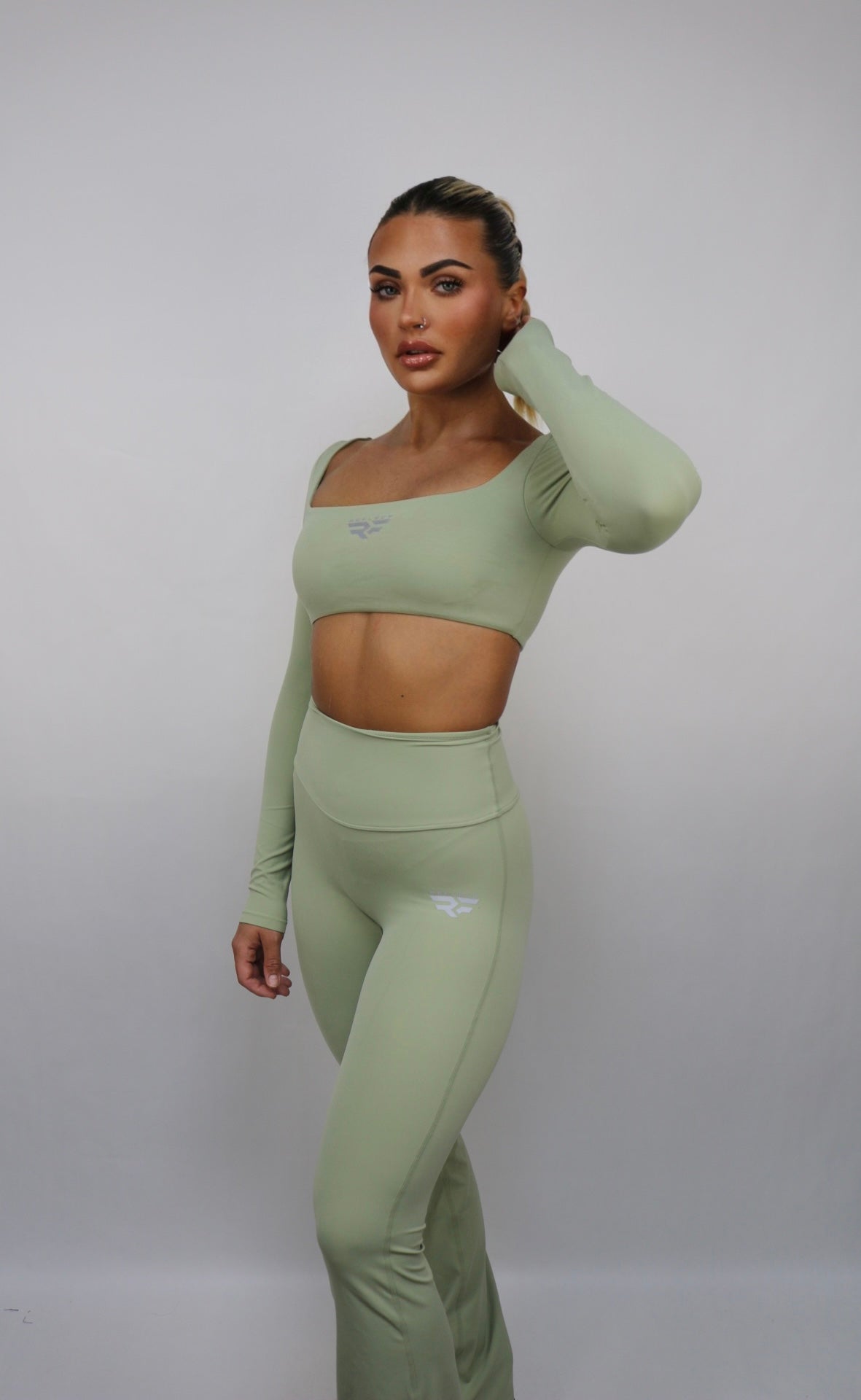 Reflect Women's Long Sleeved Crop Top & Flared Leggings Set - Green